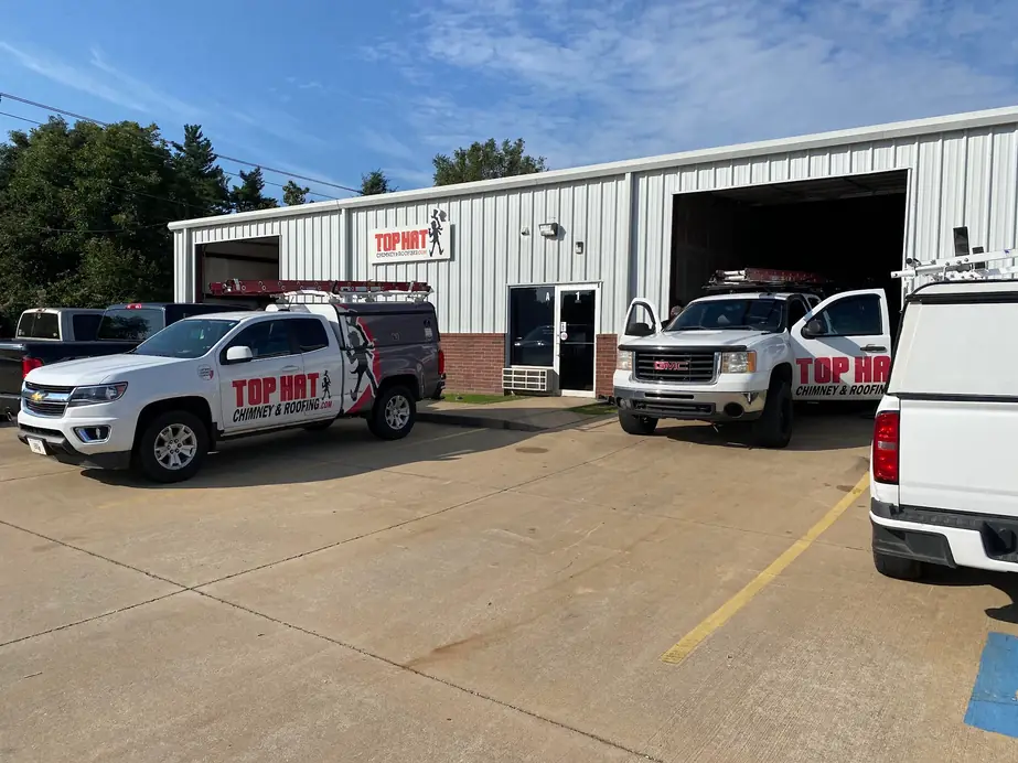 Top Hat's Springdale shop on 40th Street with branded service trucks out front