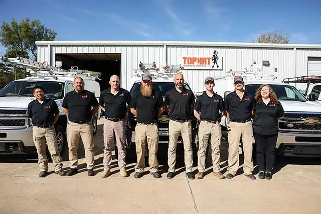 The Top Hat Chimney & Roofing crew